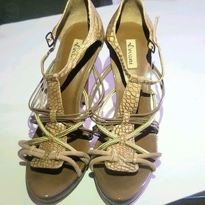 Tan strap heals with box